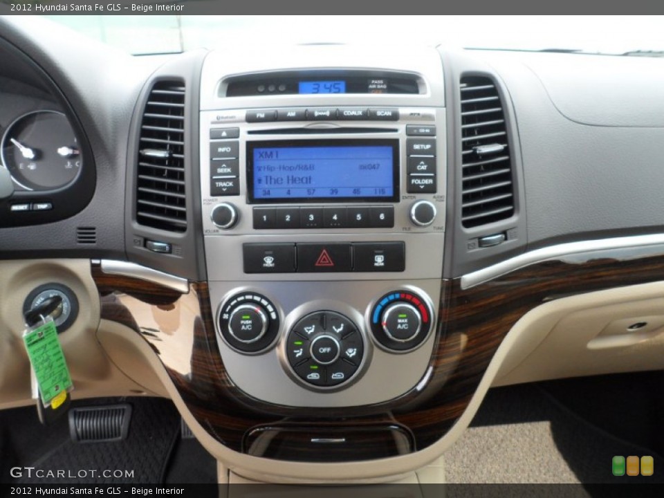 Beige Interior Controls for the 2012 Hyundai Santa Fe GLS #53611320