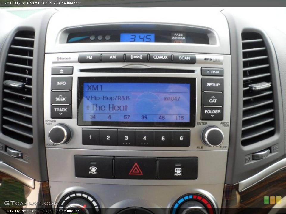 Beige Interior Audio System for the 2012 Hyundai Santa Fe GLS #53611337