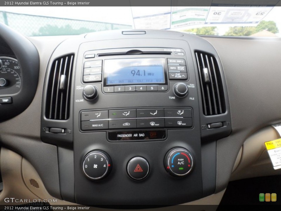 Beige Interior Controls for the 2012 Hyundai Elantra GLS Touring #53615877