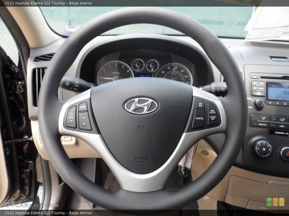 Beige Interior Steering Wheel for the 2012 Hyundai Elantra GLS Touring #53615919
