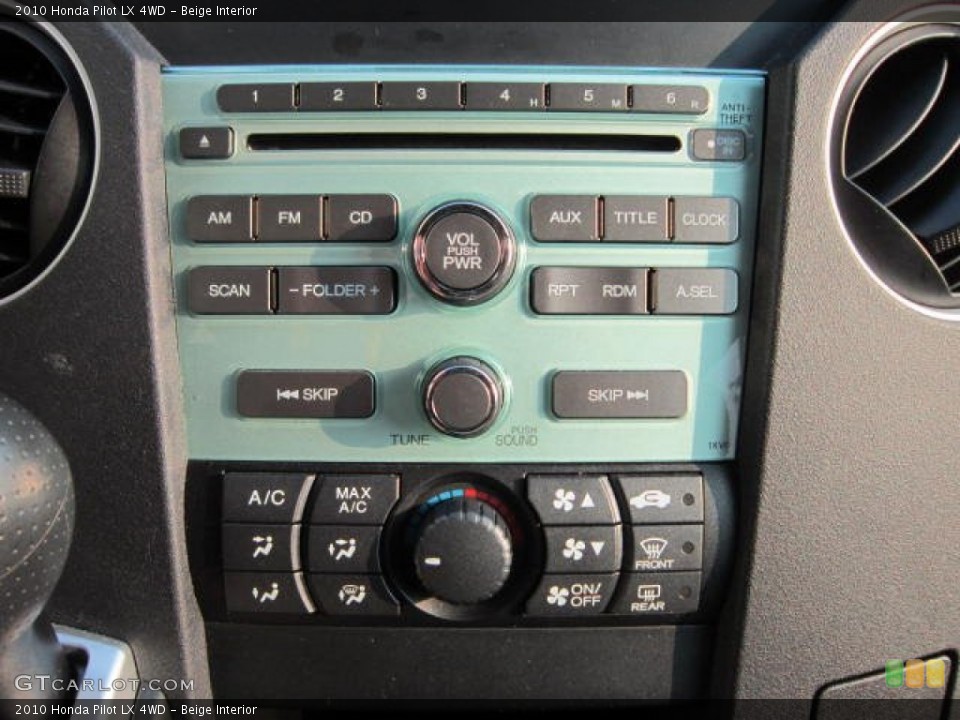 Beige Interior Controls for the 2010 Honda Pilot LX 4WD #53626636