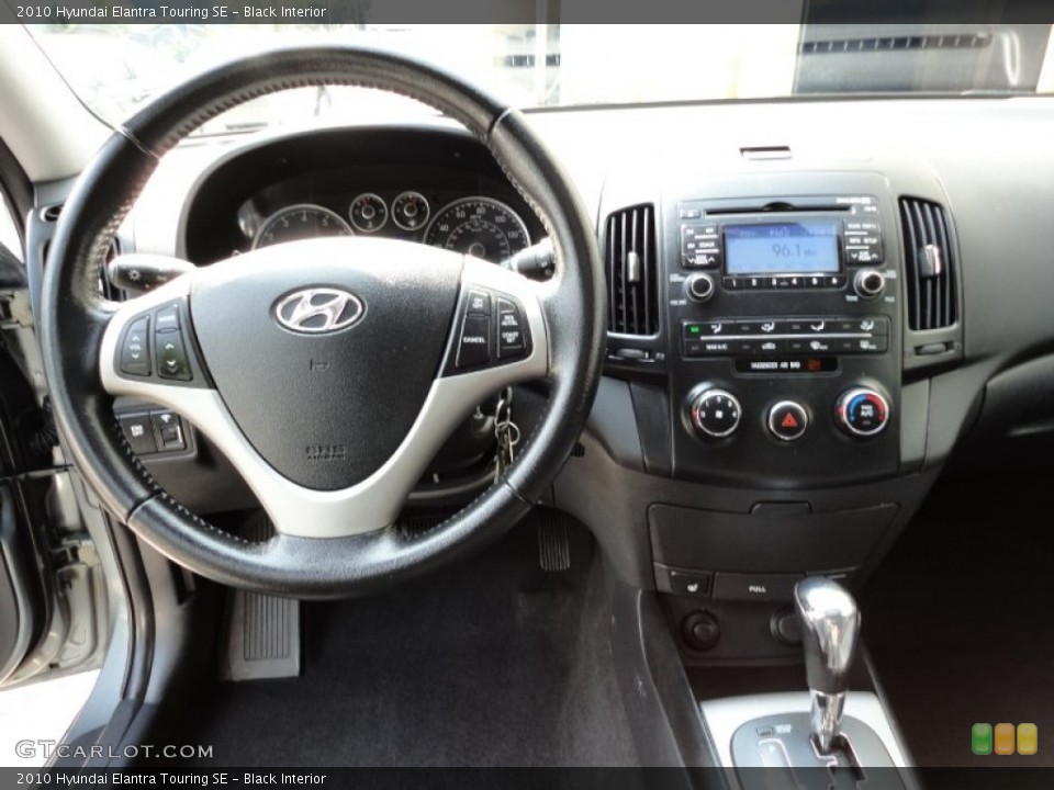 Black Interior Dashboard for the 2010 Hyundai Elantra Touring SE #53630466