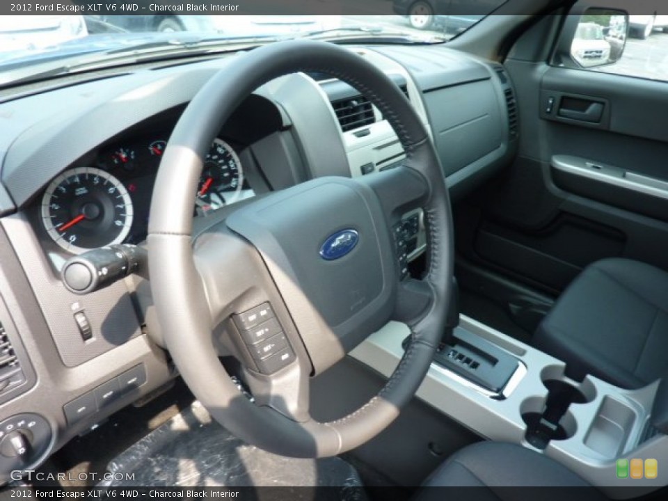 Charcoal Black Interior Steering Wheel for the 2012 Ford Escape XLT V6 4WD #53634146