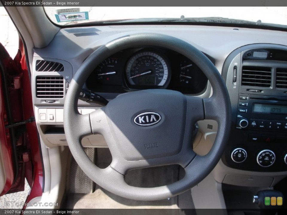 Beige Interior Steering Wheel for the 2007 Kia Spectra EX Sedan #53637146