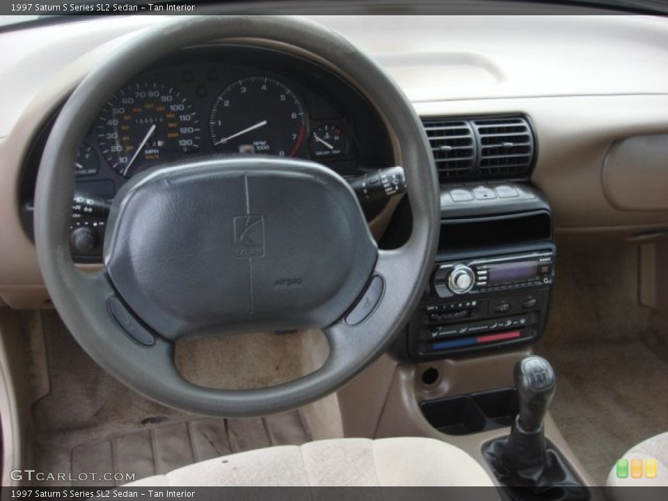 Tan Interior Dashboard for the 1997 Saturn S Series SL2 Sedan #53640585