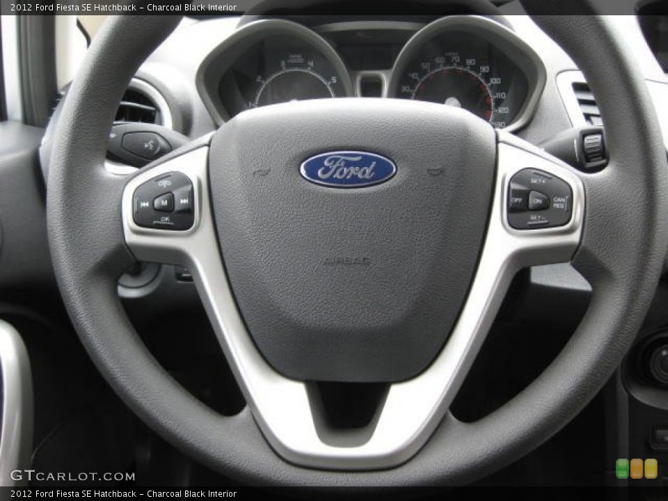 Charcoal Black Interior Steering Wheel for the 2012 Ford Fiesta SE Hatchback #53650323