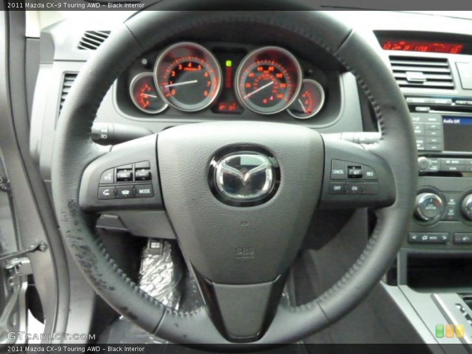 Black Interior Steering Wheel for the 2011 Mazda CX-9 Touring AWD #53653682