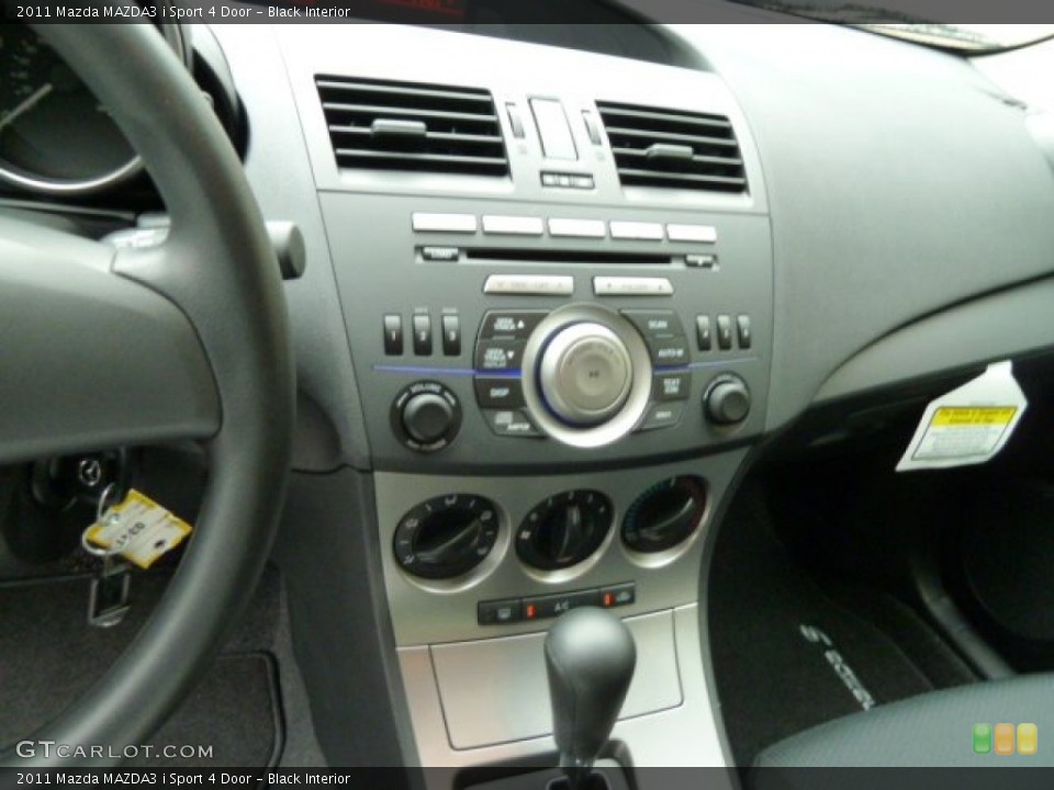 Black Interior Controls for the 2011 Mazda MAZDA3 i Sport 4 Door #53655429