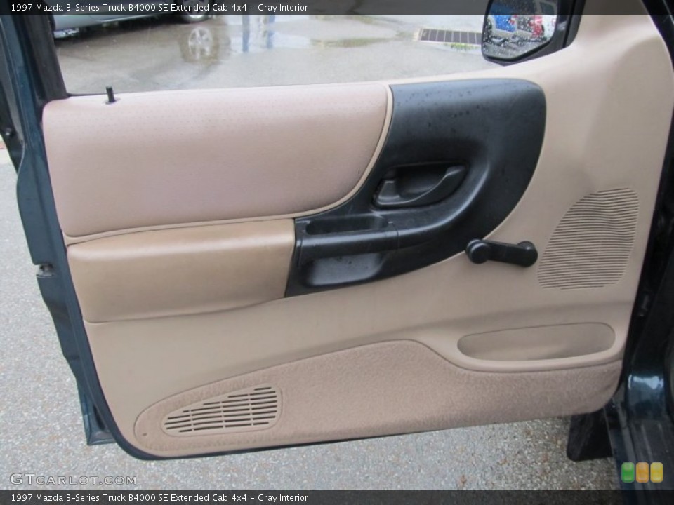 Gray Interior Door Panel for the 1997 Mazda B-Series Truck B4000 SE Extended Cab 4x4 #53669575