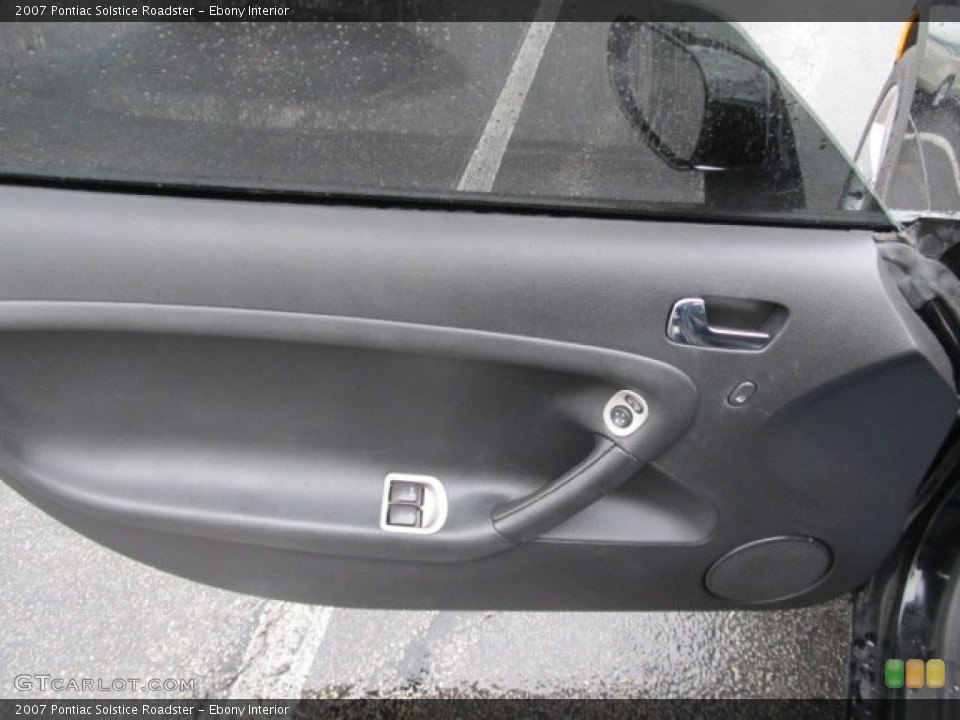 Ebony Interior Door Panel for the 2007 Pontiac Solstice Roadster #53716690