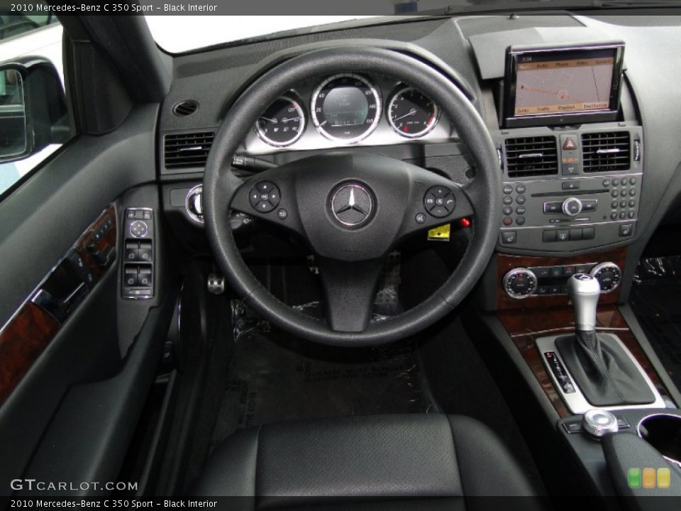 Black Interior Dashboard for the 2010 Mercedes-Benz C 350 Sport #53718597