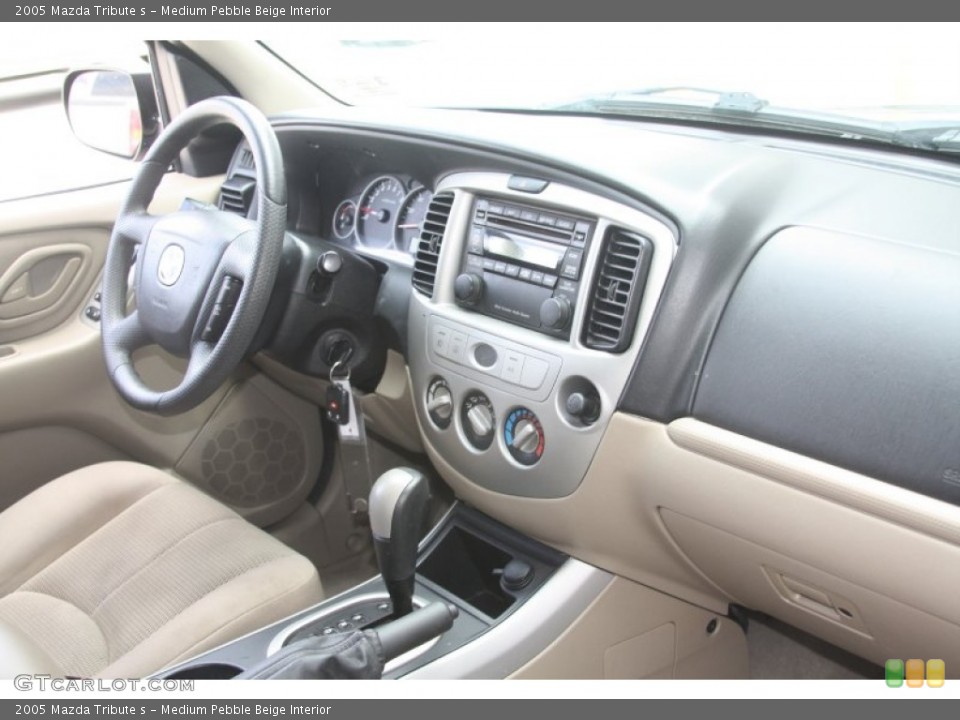 Medium Pebble Beige Interior Dashboard for the 2005 Mazda Tribute s #53719488