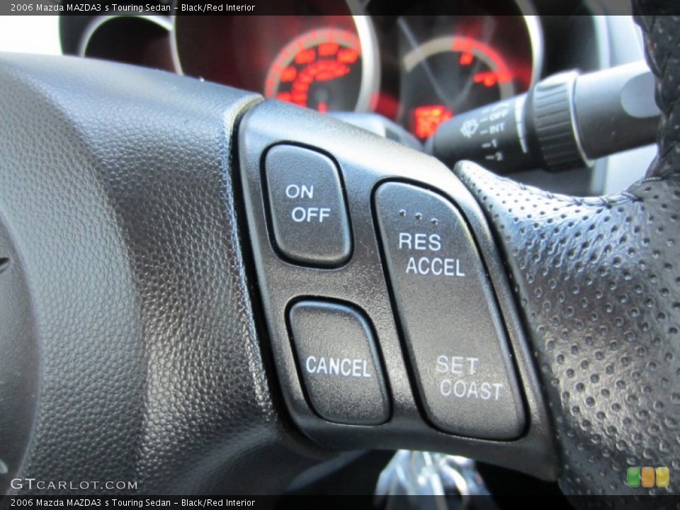 Black/Red Interior Controls for the 2006 Mazda MAZDA3 s Touring Sedan #53766665