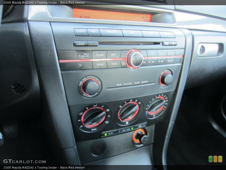 Black/Red Interior Controls for the 2006 Mazda MAZDA3 s Touring Sedan #53766671