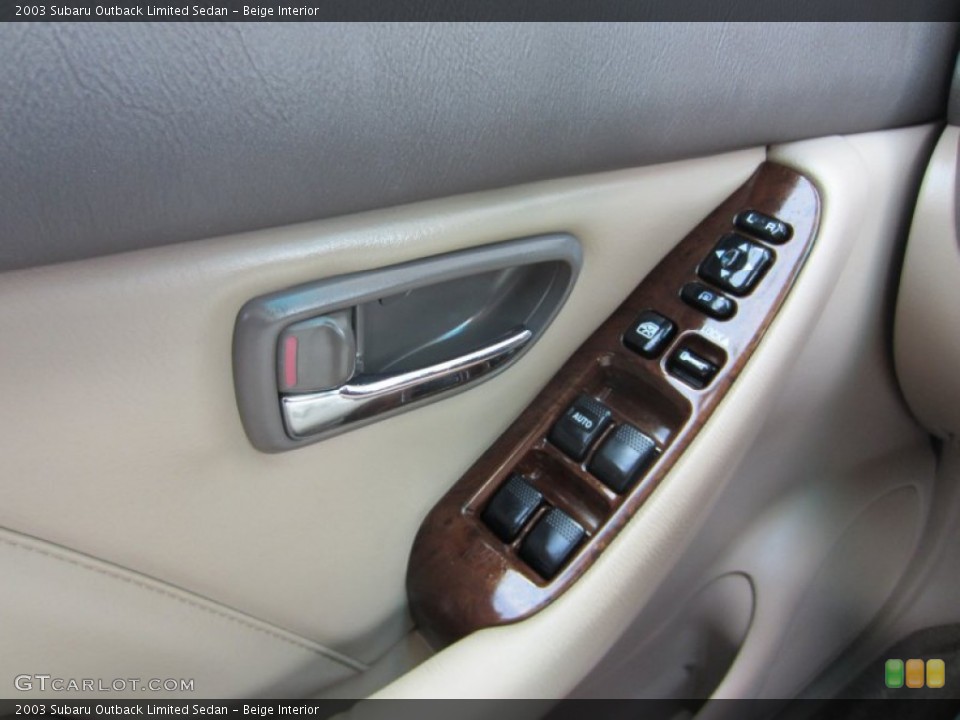 Beige Interior Controls for the 2003 Subaru Outback Limited Sedan #53767073