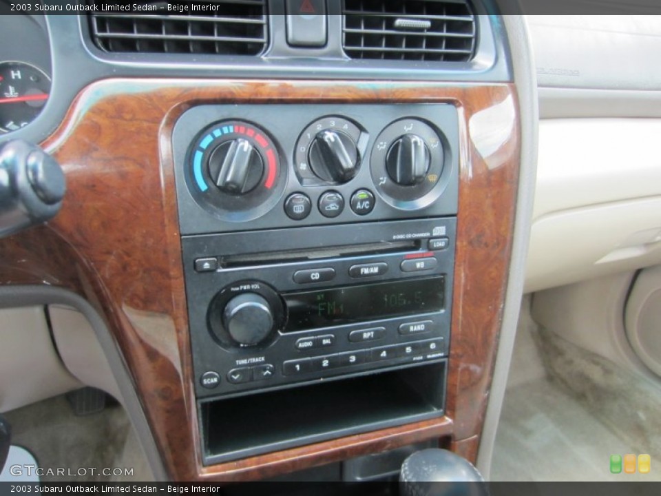 Beige Interior Controls for the 2003 Subaru Outback Limited Sedan #53767097