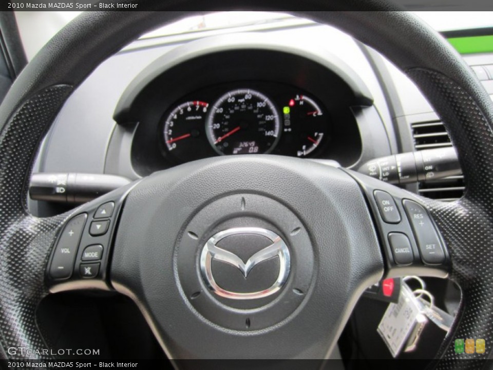 Black Interior Steering Wheel for the 2010 Mazda MAZDA5 Sport #53776270