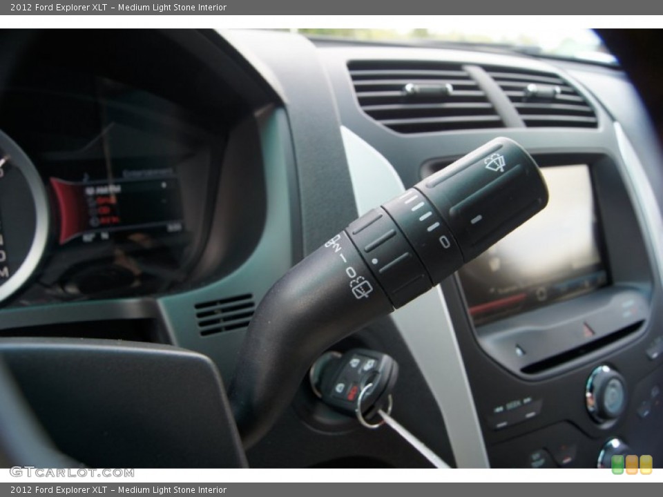 Medium Light Stone Interior Controls for the 2012 Ford Explorer XLT #53845239