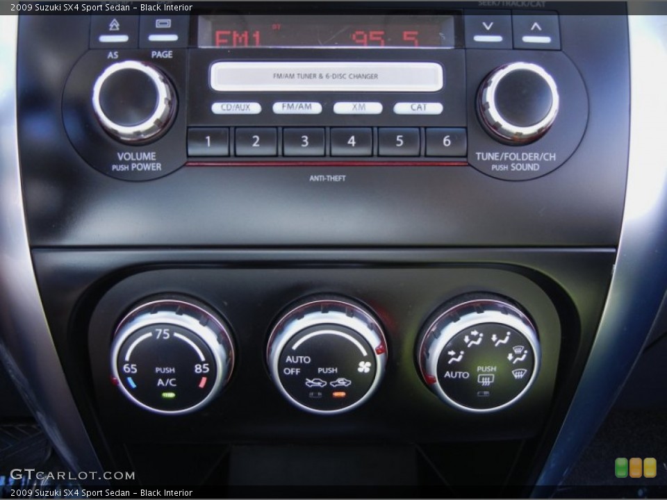 Black Interior Controls for the 2009 Suzuki SX4 Sport Sedan #53859742
