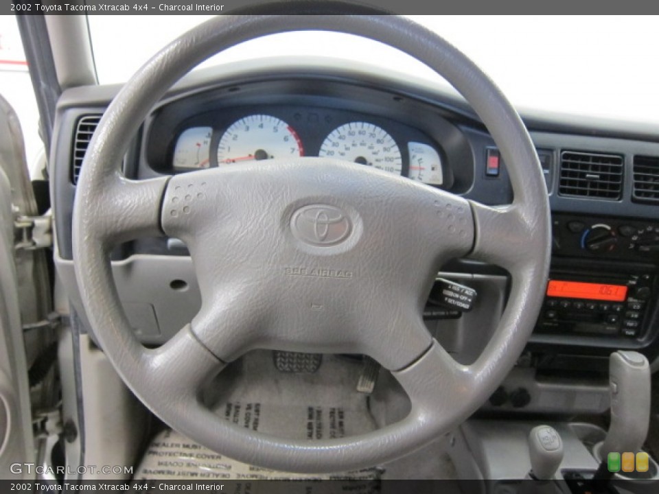 Charcoal Interior Steering Wheel for the 2002 Toyota Tacoma Xtracab 4x4 #53862340