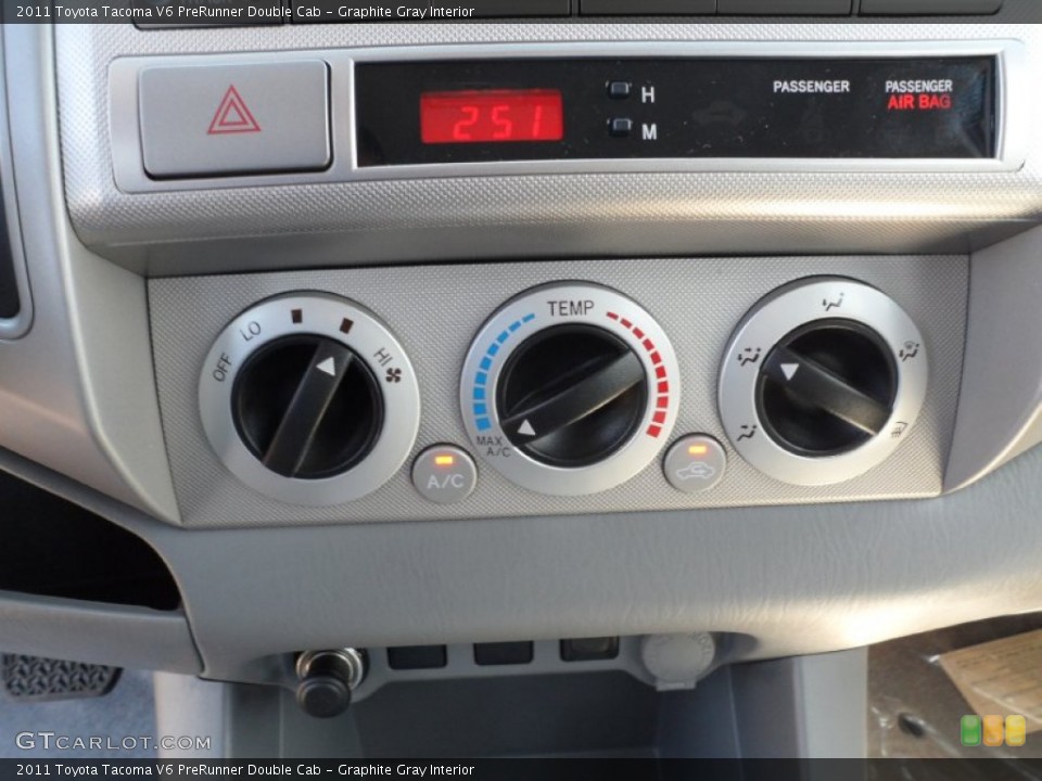 Graphite Gray Interior Controls for the 2011 Toyota Tacoma V6 PreRunner Double Cab #53875558