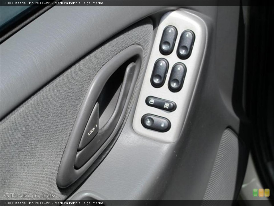 Medium Pebble Beige Interior Controls for the 2003 Mazda Tribute LX-V6 #53881286