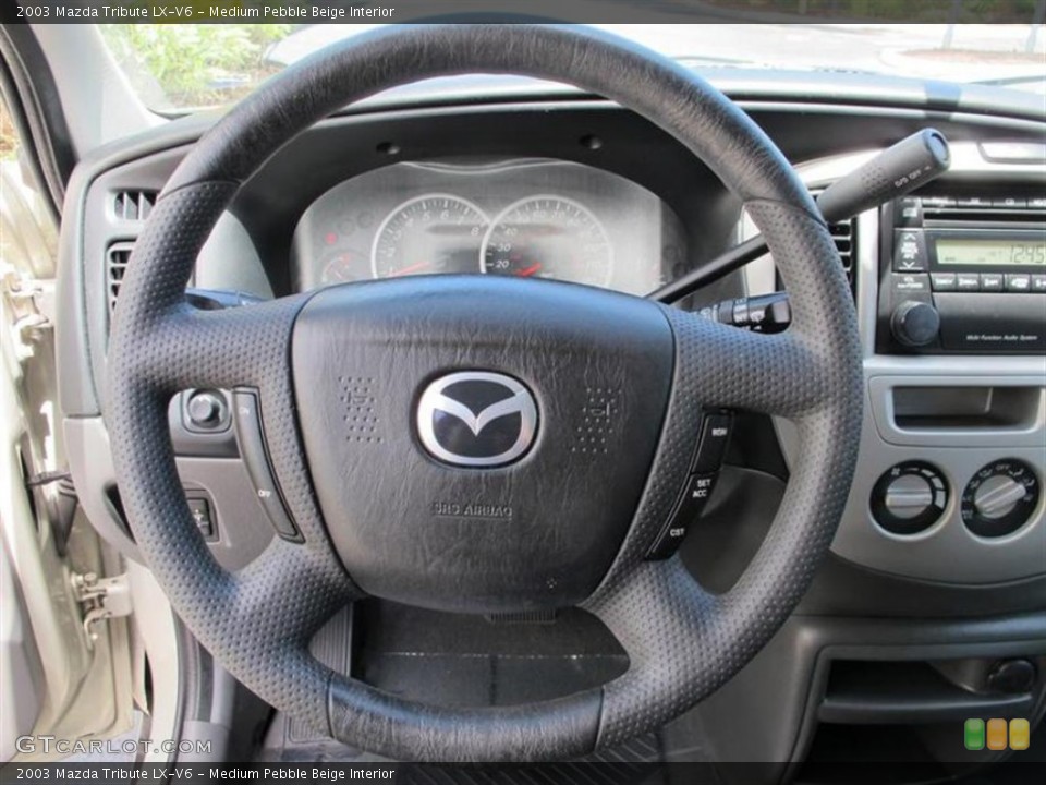 Medium Pebble Beige Interior Steering Wheel for the 2003 Mazda Tribute LX-V6 #53881307