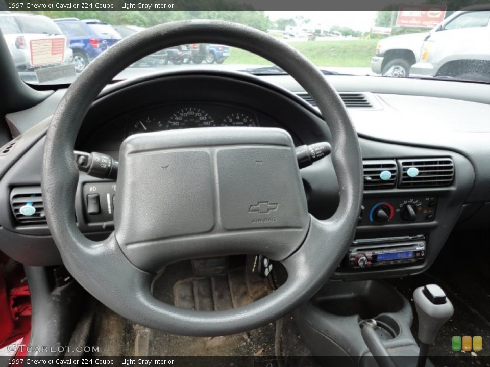 Light Gray Interior Steering Wheel for the 1997 Chevrolet Cavalier Z24 Coupe #53894027