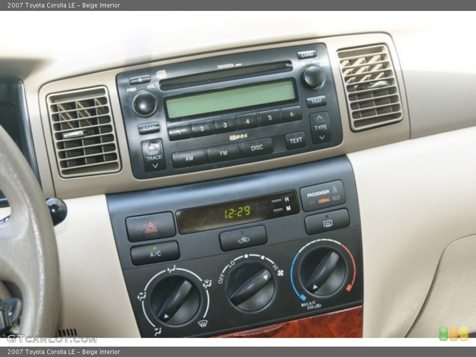 Beige Interior Controls for the 2007 Toyota Corolla LE #53894528