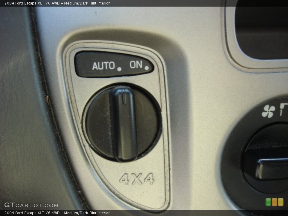 Medium/Dark Flint Interior Controls for the 2004 Ford Escape XLT V6 4WD #53909029