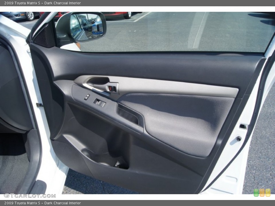 Dark Charcoal Interior Door Panel for the 2009 Toyota Matrix S #53954132