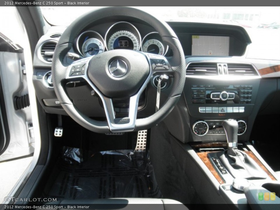 Black Interior Dashboard for the 2012 Mercedes-Benz C 250 Sport #53956574