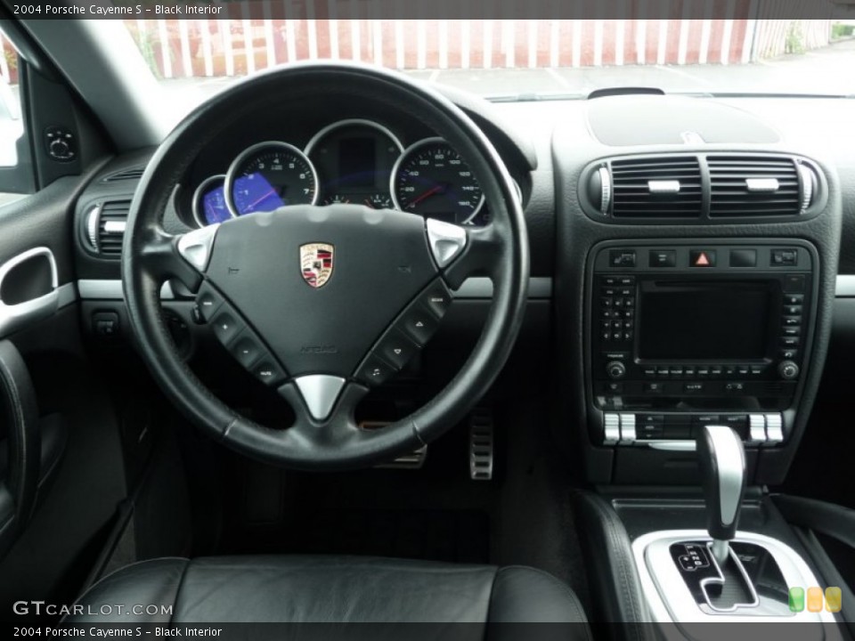 Black Interior Dashboard for the 2004 Porsche Cayenne S #53963174