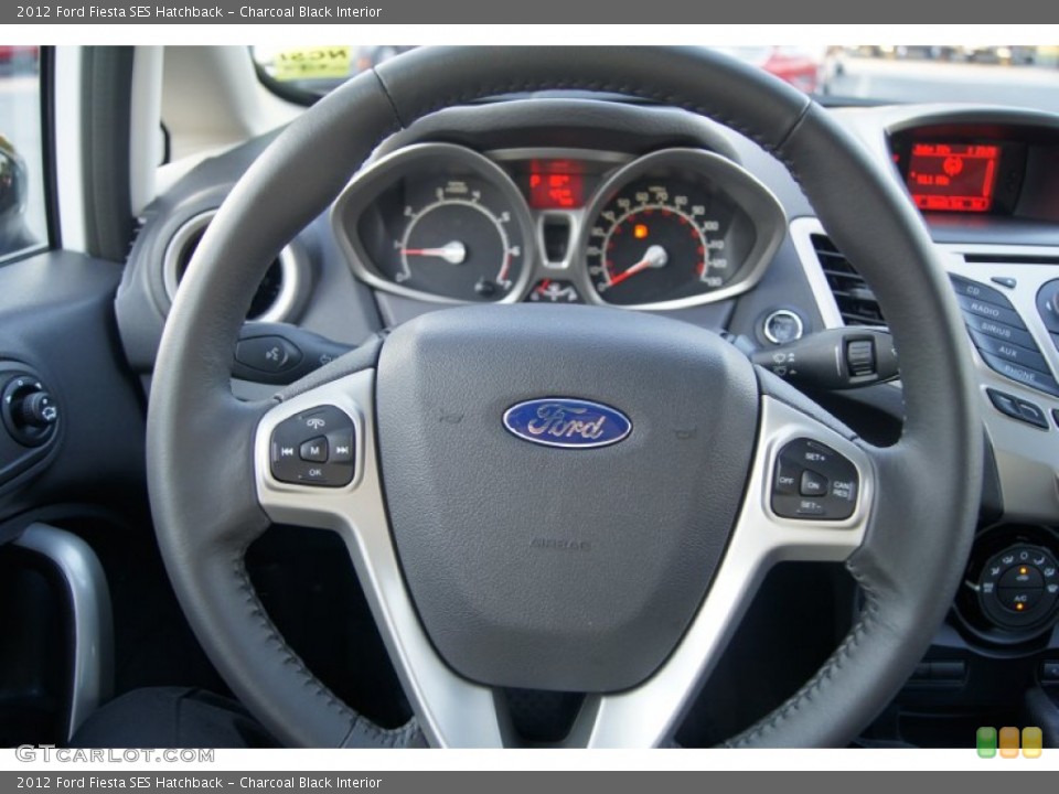 Charcoal Black Interior Steering Wheel for the 2012 Ford Fiesta SES Hatchback #53966639