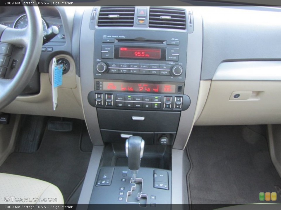 Beige Interior Controls for the 2009 Kia Borrego EX V6 #53968224