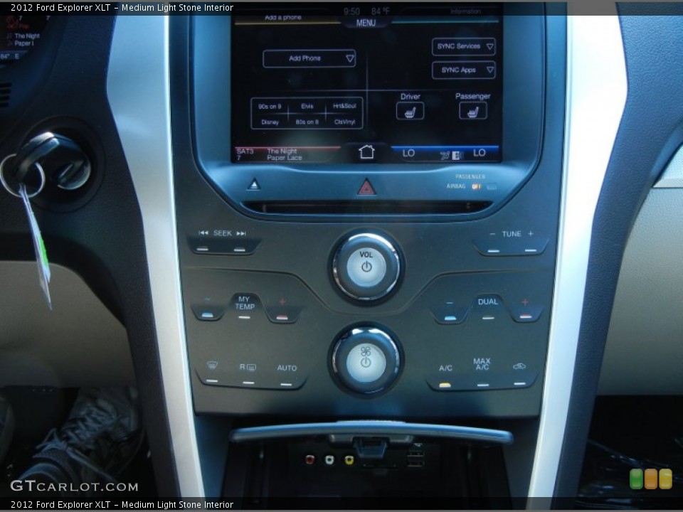 Medium Light Stone Interior Controls for the 2012 Ford Explorer XLT #53968296