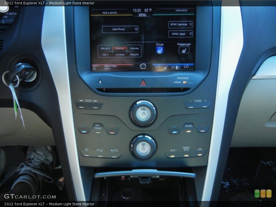 Medium Light Stone Interior Controls for the 2012 Ford Explorer XLT #53968839