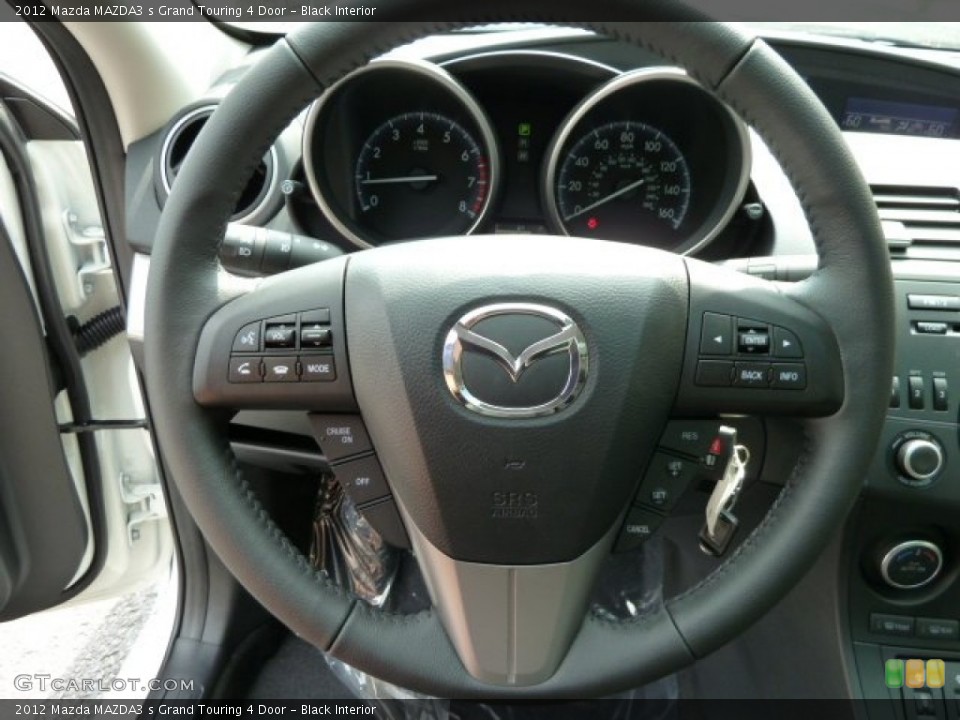 Black Interior Steering Wheel for the 2012 Mazda MAZDA3 s Grand Touring 4 Door #53970336