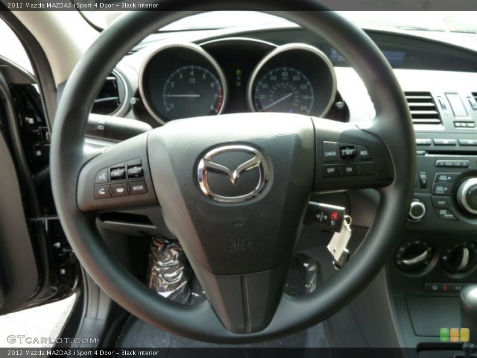 Black Interior Steering Wheel for the 2012 Mazda MAZDA3 i Sport 4 Door #53970510