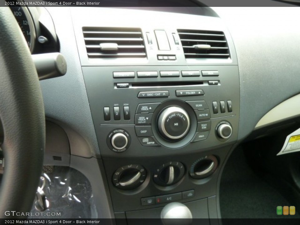 Black Interior Controls for the 2012 Mazda MAZDA3 i Sport 4 Door #53970528