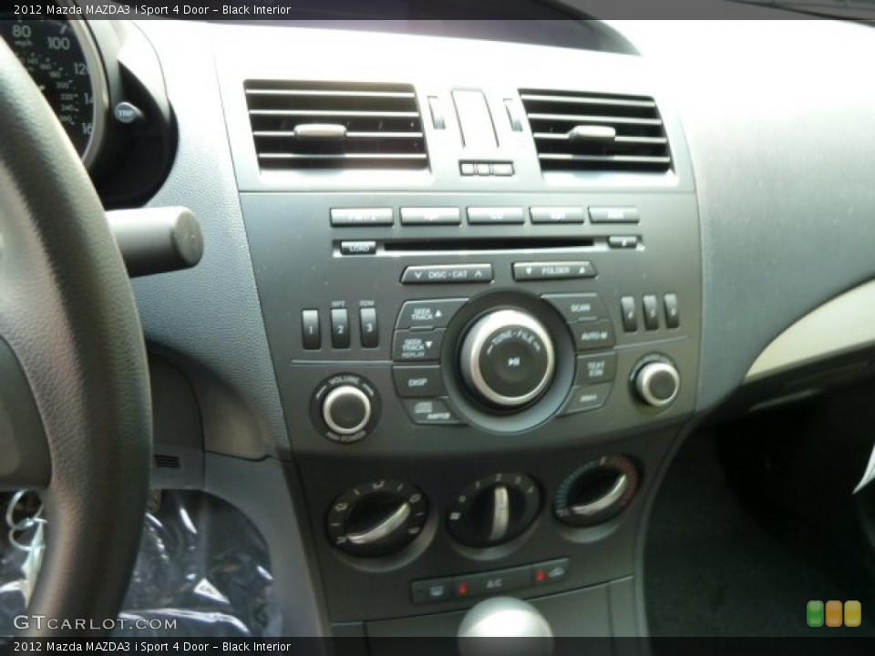 Black Interior Controls for the 2012 Mazda MAZDA3 i Sport 4 Door #53971066