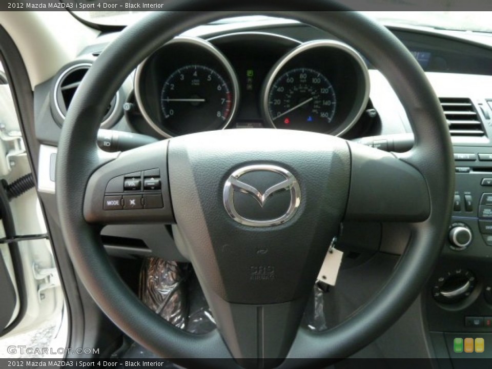 Black Interior Steering Wheel for the 2012 Mazda MAZDA3 i Sport 4 Door #53971236
