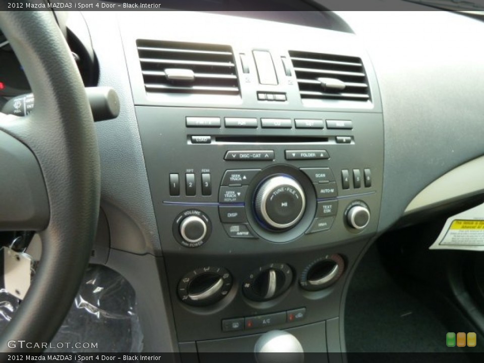 Black Interior Controls for the 2012 Mazda MAZDA3 i Sport 4 Door #53971254