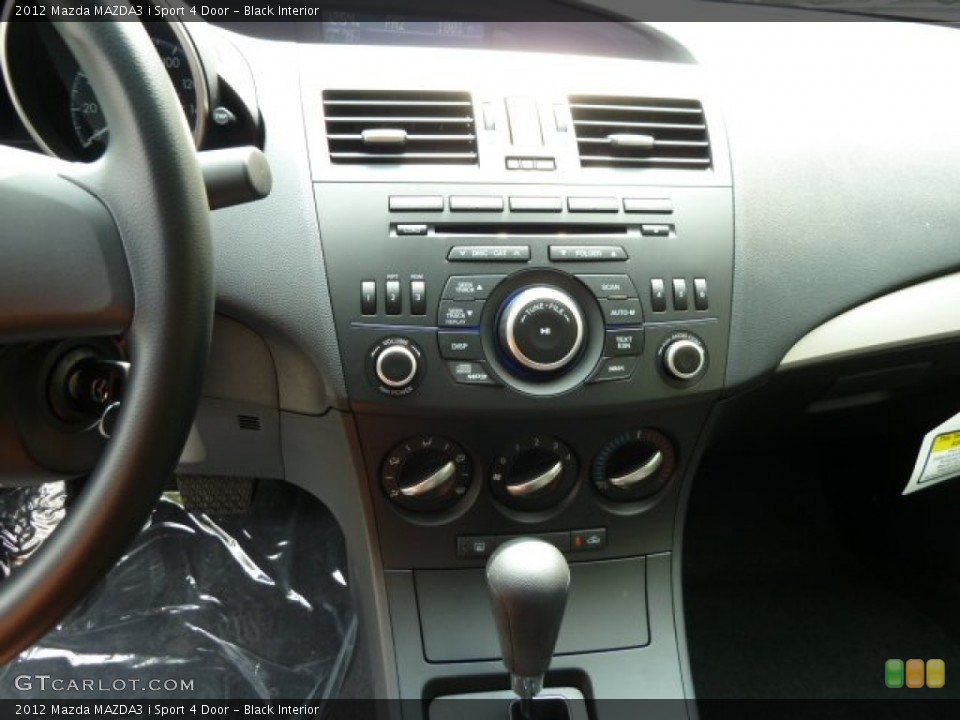 Black Interior Controls for the 2012 Mazda MAZDA3 i Sport 4 Door #53971433