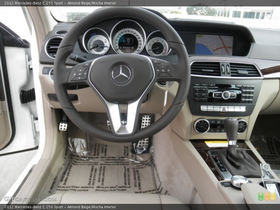 Almond Beige/Mocha Interior Dashboard for the 2012 Mercedes-Benz C 250 Sport #53971995