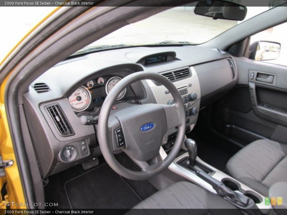 Charcoal Black Interior Prime Interior for the 2009 Ford Focus SE Sedan #53974017