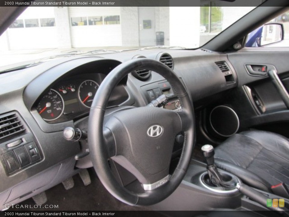 Black Interior Dashboard for the 2003 Hyundai Tiburon  #53974227
