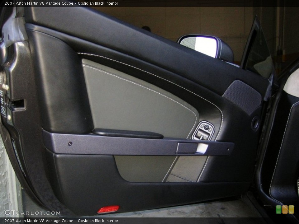Obsidian Black Interior Door Panel for the 2007 Aston Martin V8 Vantage Coupe #53984477
