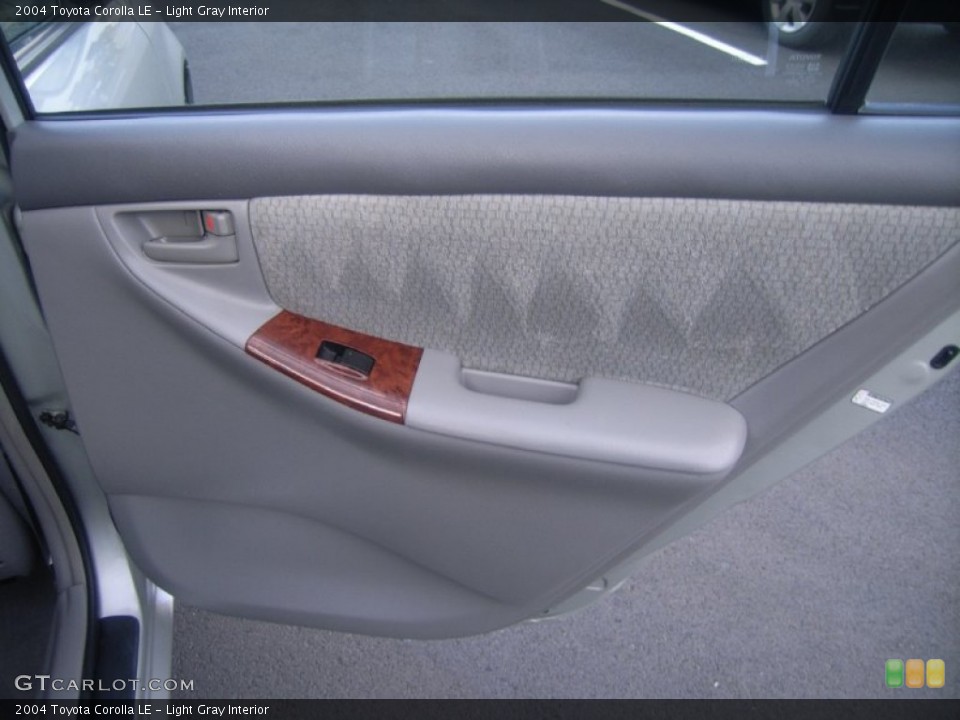 Light Gray Interior Door Panel for the 2004 Toyota Corolla LE #53999483