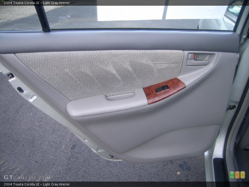 Light Gray Interior Door Panel for the 2004 Toyota Corolla LE #53999489
